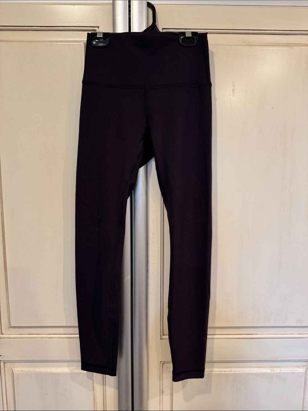 Lululemon black size 4 24 inch inseam leggings. Not sure of style